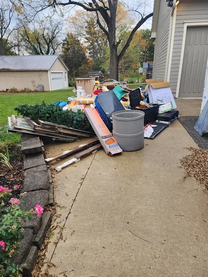 Dumpster being loaded with debris for 30 Yard Dumpster Rental in Chester